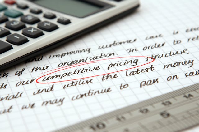 competitive pricing circled in red on a paper