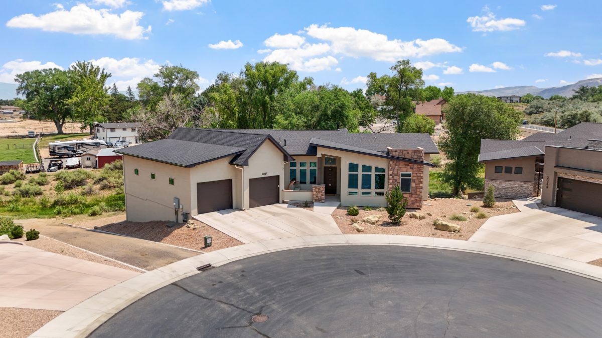 2057 Sienna Creek Ct in Grand Junction featuring Redlands location and Colorado National Monument views